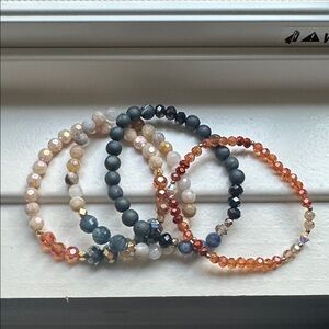 Set of 4 Strechy bracelets made with high quality beads.